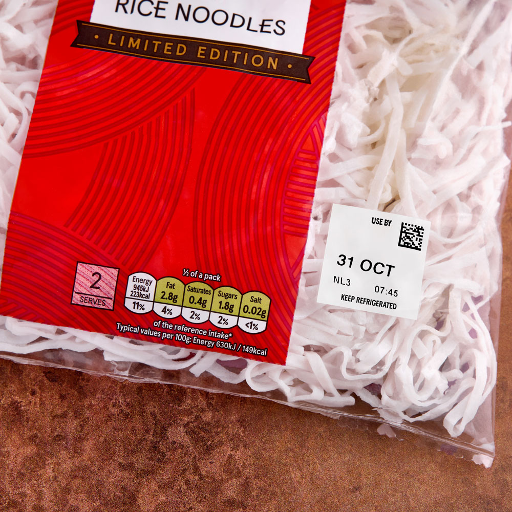 Chilled noodle pack coded with a use by date, batch code and 2D data matrix code